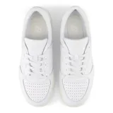 Championes New Balance modelo T-500 CT500LPC, color blanco, confeccionados en cuero, con logo "N" característico en los laterales y suela de goma.