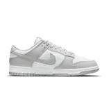Zapatillas Nike Dunk Low Retro en blanco y gris.