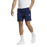 Shorts deportivos Adidas Train Essentials, color azul marino, con logo blanco estampado en la pierna izquierda, cintura elástica con cordón ajustable y aberturas laterales para mayor libertad de movimiento. Confeccionados en tejido de punto doble suave y tecnología AEROREADY para mantener la piel seca.