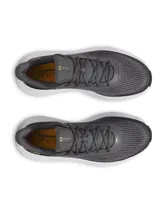 Championes Under Armour Charged Rogue 5 para hombre, color azul marino con detalles en amarillo flúor y suela blanca. Ideales para running y entrenamiento.