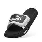 Sandalias Puma Softride Pro, color blanco y negro, con ajuste de velcro y logo de la marca en la tira.