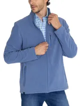 Campera polar celeste de micropolar liviano con cierre completo y tres bolsillos frontales. Confeccionado con poliéster reciclado a partir de botellas plásticas.