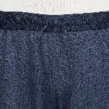 Shorts de fútbol Nike Dri-FIT Strike para hombre, color azul con diseño geométrico y franjas laterales en verde agua. Logo de Nike estampado en blanco en la pierna izquierda.