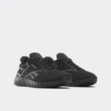 Championes Reebok Nano Gym color negro, ideales para correr, entrenar con pesas y clases de fitness. Diseño tipo botín con ajuste cómodo, base de TPU para soporte lateral y suela de EVA y goma.