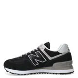 Championes New Balance modelo 574, color negro con detalles en gris y blanco, confeccionados en gamuza y malla, con logo "N" característico en los laterales y entresuela ENCAP.