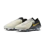 Championes de fútbol Nike Phantom GX 2 Elite FG, color blanco con detalles en negro y dorado.