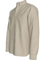 Camisa de hombre Tommy Hilfiger color beige, de corte regular, manga larga y cuello abotonado.