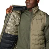 Chaleco acolchado Columbia Delta Ridge II para hombre, color azul marino con logo de la marca en el pecho. Cuenta con tecnología termorreflectiva Omni-Heat, HeatSeal y Omni-Shield. Relleno de plumón con certificación RDS.