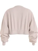 Buzo Calvin Klein Jeans color beige, de corte cropped, con cuello en V y logo bordado en el pecho.