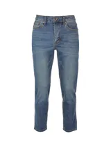 Pantalón de jean de corte recto, color azul oscuro, con cinco bolsillos y logo de CAT en la parte trasera.