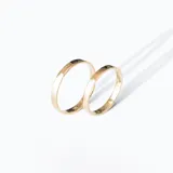 Par de alianzas de oro amarillo 18k, modelo cinta, de 3mm de ancho.