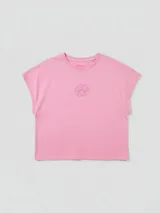 Musculosa rosa de algodón con bordado de flor en el centro.