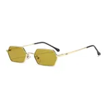 Lentes de sol unisex con montura metálica negra y lentes hexagonales grises con filtro UV400.
