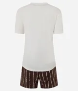 Conjunto de pijama Lov de viscosa con remera de manga corta color crudo con estampa de barco y short rayado con cintura elástica.