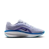 Championes de running Nike Winflo 11, color lila con detalles en azul y blanco.