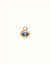 Charm de piercing con forma de ojo, hecho de aleación de metales y baño en plata, adornado con cristal Swarovski color light saphire.
