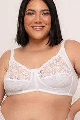 Soutien reductor blanco sin aro, confeccionado en lycra y puntilla elastizada, con escote alto, breteles elásticos regulables y broches reforzados en la espalda.