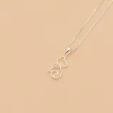 Conjunto de collar y dije de gato en plata con circonias.