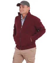 Campera micropolar azul marino con cierre frontal y diseño de corte clásico.
