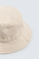 Sombrero tipo bucket azul marino de algodón con efecto lavado y ala ancha con pespuntes.
