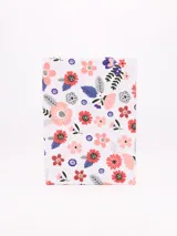 Juego de sábanas estampadas con motivos florales en tonos rosa, rojo, azul y gris.