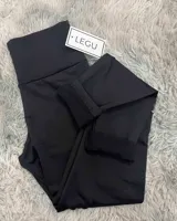 Calza larga chupín de tela suplex color negro, con felpa en el interior y tiro alto.