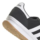 Championes Adidas Run 72 negros con detalles en blanco y suela color caramelo.