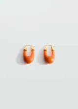 Par de aros tipo argolla color naranja con detalles dorados.