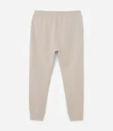 Pantalón deportivo de hombre color beige, liso, con ajuste elástico en la cintura y bolsillos laterales.