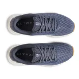 Championes Under Armour Charged Aurora para mujer, color negro con detalles en gris y suela blanca.