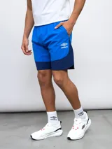 Short de entrenamiento azul marino y azul eléctrico, con escudo del Club Nacional de Football estampado en el lateral.