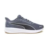 Championes Puma Transport color gris con detalles en negro y blanco. Capellada de malla, suela de goma y cierre con cordones.