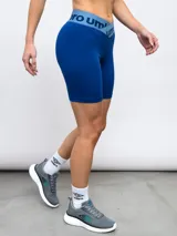 Calza corta de lycra negra con cintura alta y logo de la marca estampado en gris.