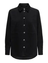 Camisa negra de pana con cuello clásico, mangas largas y puños con botones. Corte holgado.