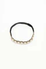 Vincha elástica bordada con piedras facetadas y strass.