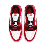 Championes Air Jordan Legacy 312 de cuero color blanco, rojo y negro, con detalles de estampado de elefante en el talón y correa ajustable en el empeine.