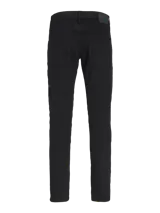 Jean negro de corte slim fit, con tiro bajo, rodilla ajustada y abertura de pierna ceñida. Diseño clásico de cinco bolsillos y cierre con botón.