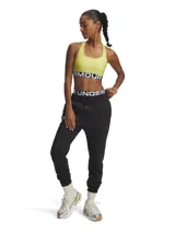 Top deportivo Under Armour color amarillo con banda elástica inferior con logo de la marca.