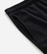 Pantalón deportivo negro de corte slim, con cintura elástica y bolsillos laterales.
