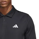 Chomba de tenis Adidas Club, color negro, con logo blanco bordado en el pecho. Confeccionada con tejido transpirable AEROREADY y paneles de malla en la espalda.