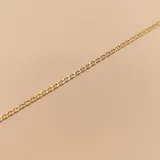 Pulsera de oro 18k, con un diseño delicado y detalles finos.