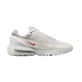 Championes Nike Air Max Pulse color blanco con detalles en rojo.