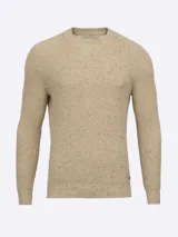 Sweater de punto color beige con motas de colores, cuello redondo y mangas largas. Terminaciones en rib.