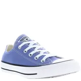 Championes Converse modelo Chuck Taylor Classic OX, color lila, de lona con suela de goma blanca y cordones blancos.