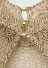 Vestido largo de punto de canalé color dorado, con espalda descubierta y cuello perkins.