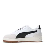 Championes urbanos Puma Shuffle Downtown, color negro con detalles en blanco y suela color caramelo.