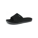 Chinelas negras de goma con el logo de la marca Mikaela en el lateral.