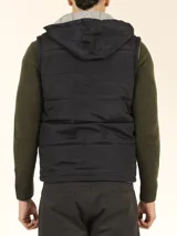 Chaleco verde militar de nylon mate reversible con interior de tejido jogging gris melange, con capucha y cierre frontal con cremallera.