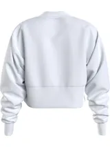 Buzo blanco de algodón orgánico, corte cropped, cuello redondo y mangas largas. Logotipo de Calvin Klein Jeans en el pecho.