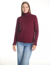 Polera tejida en hilado fino color verde oscuro, de manga larga con tajo en el puño y cuello alto.